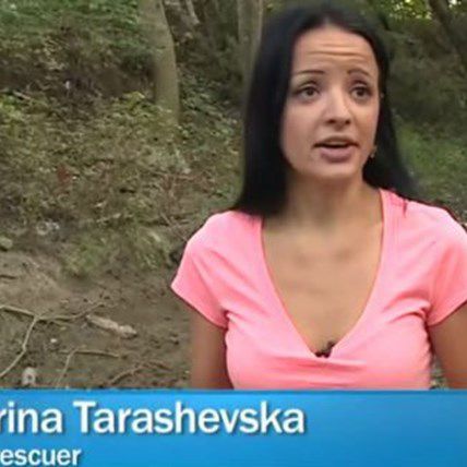 Woman Rescues Barely Living Dog from Mass Dog Grave